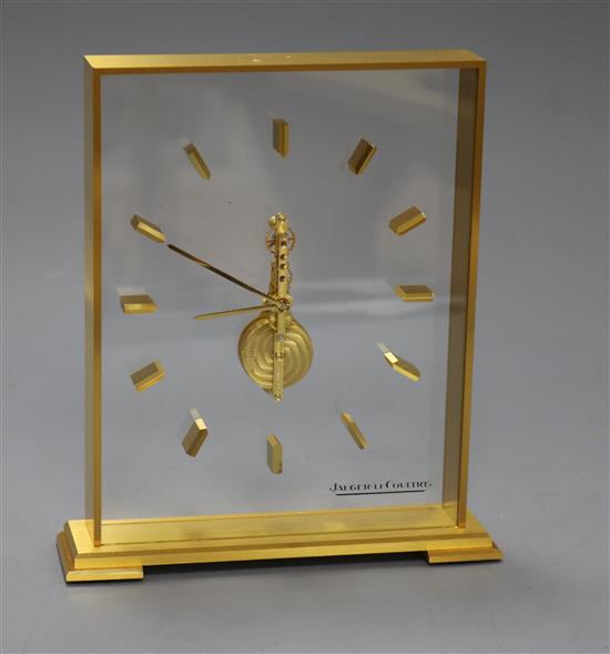 A Jaeger le Coultre, Geneve mantel clock with case and paperwork H.19.5